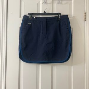 Lacoste Sport Skort. NWT, extra button still attached. Perfect condition.